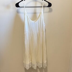 Elegant White Lace-Trimmed Beach Dress